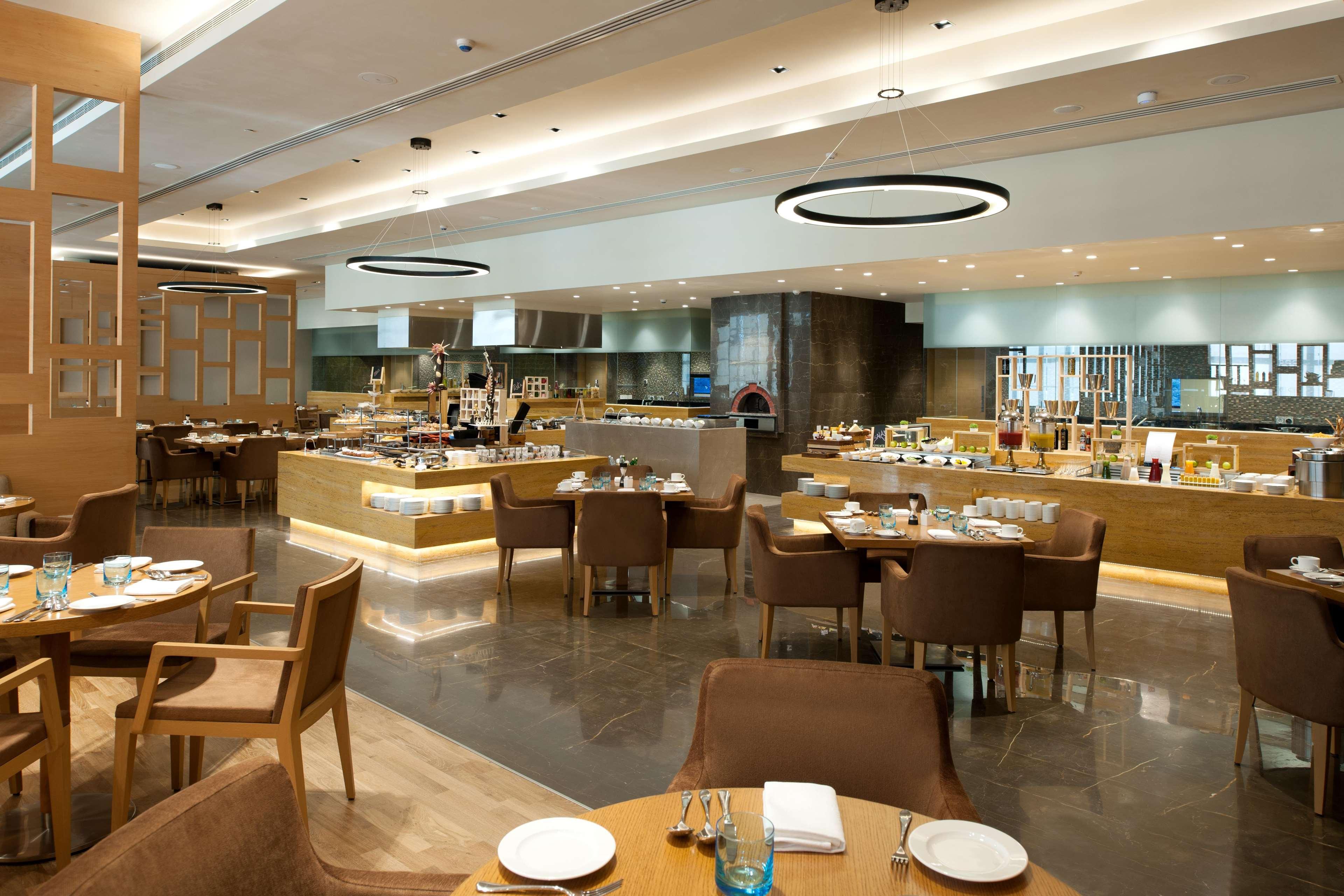 Hotel Feathers- A Radha Hotel,