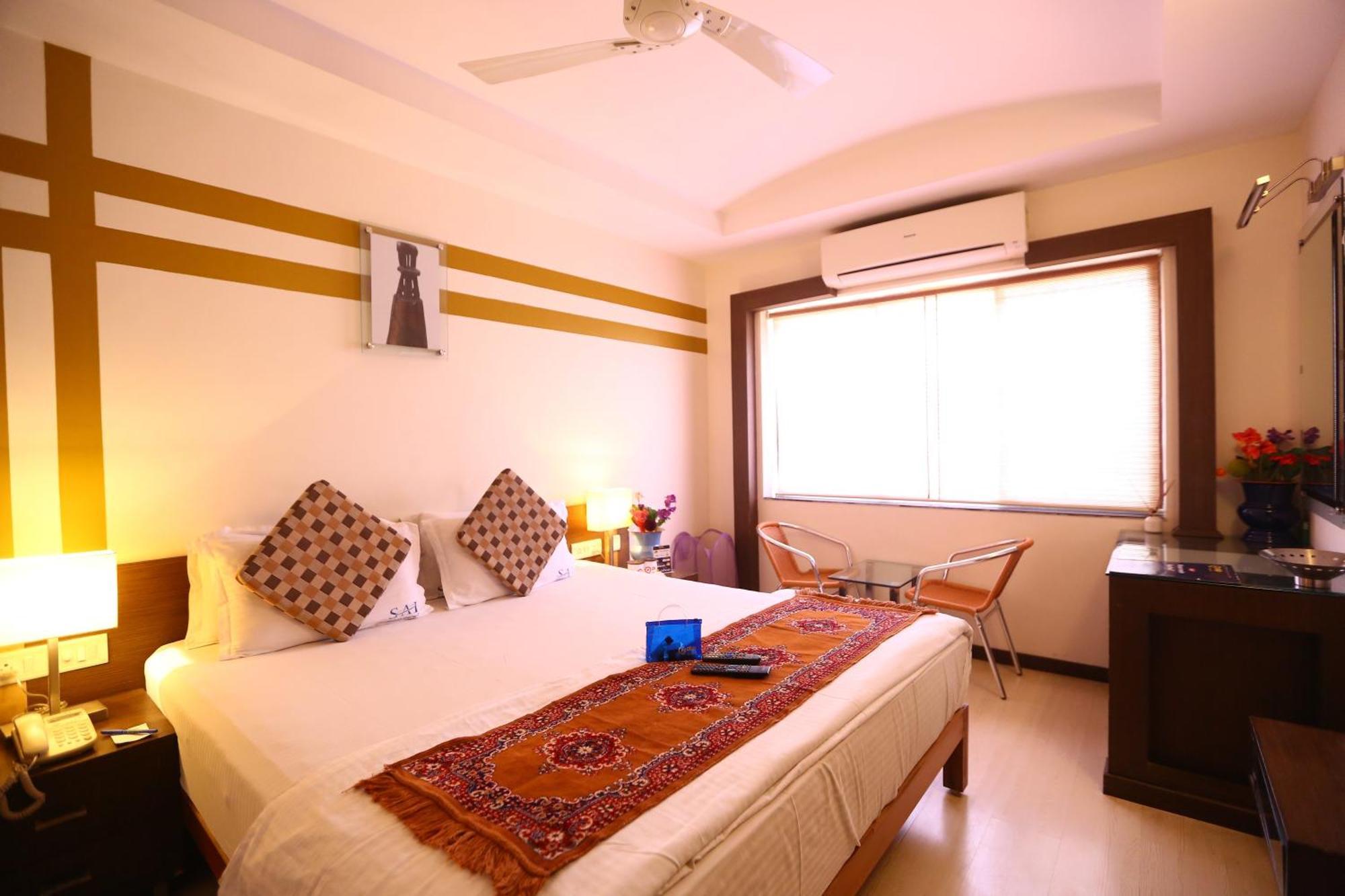 Capital O J Service Hotel