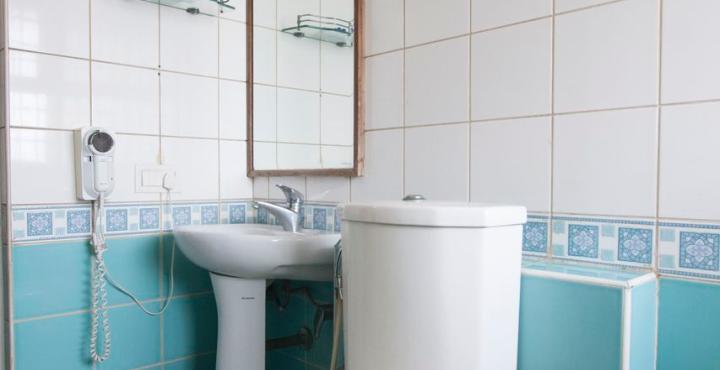 Hotel Capital O 66763 Blossoms Serviced Apartments