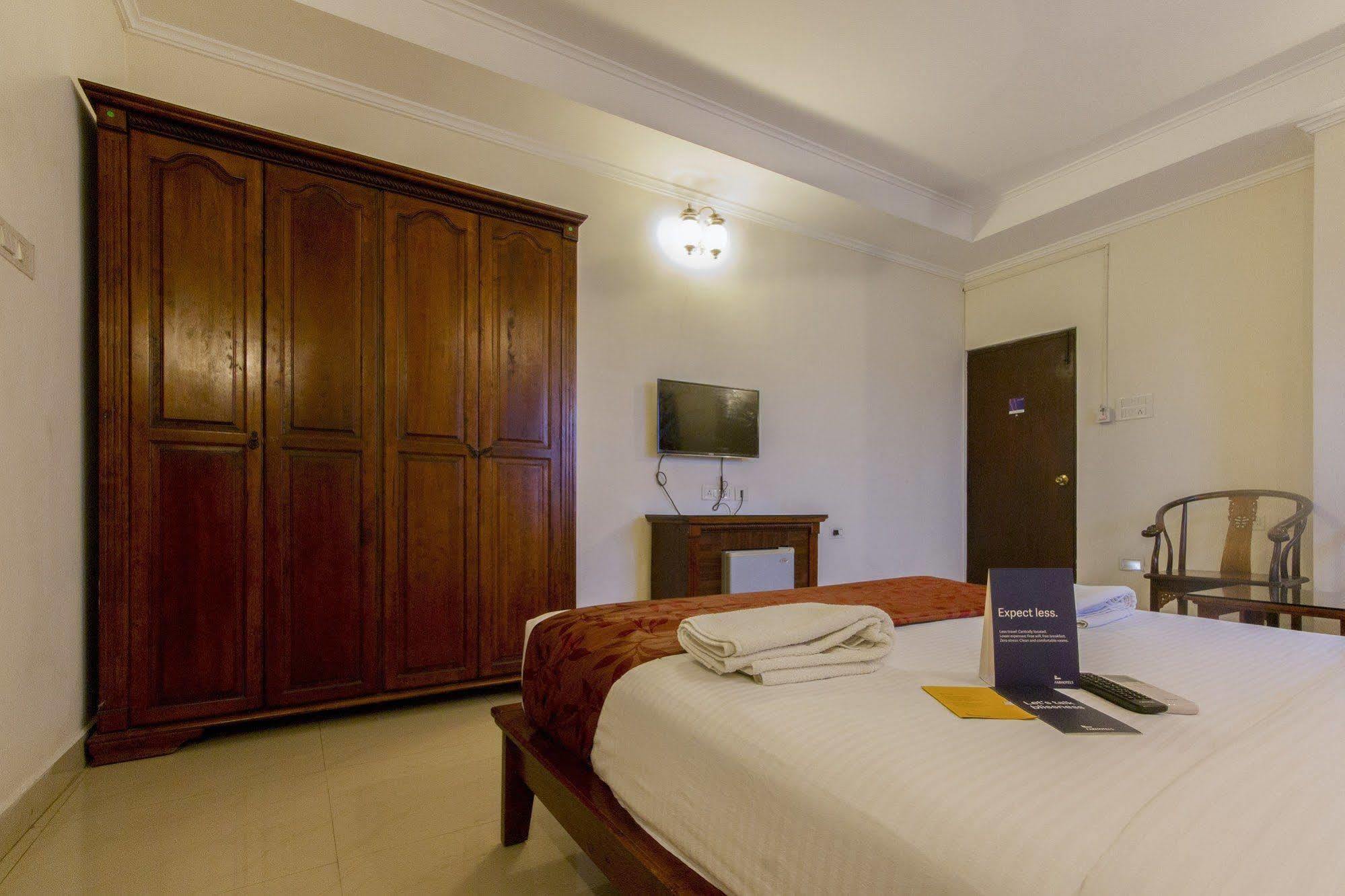 Capital O 66763 Blossoms Serviced Apartments Hotel