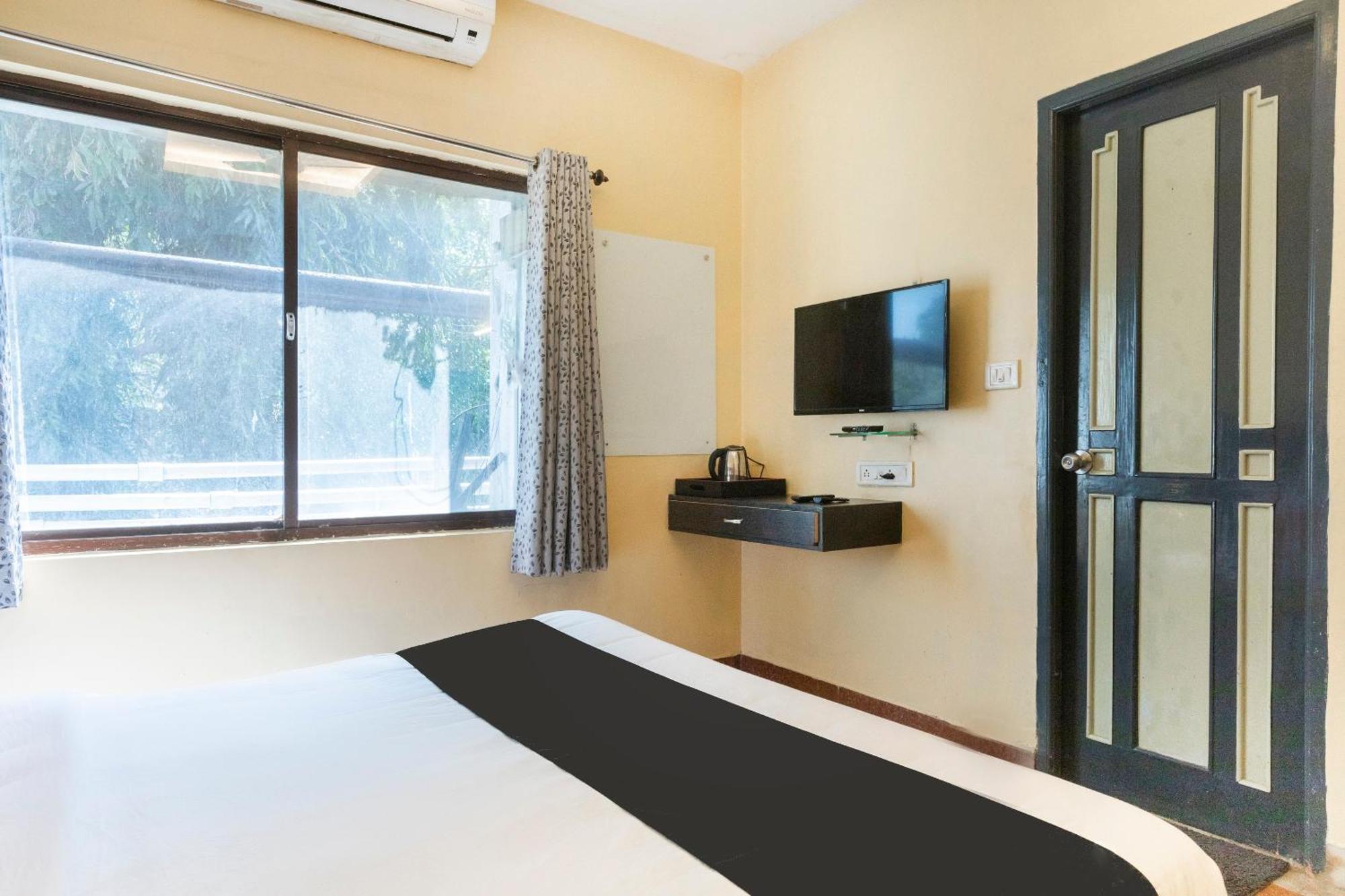 Collection O Santhome Residency Near Marina