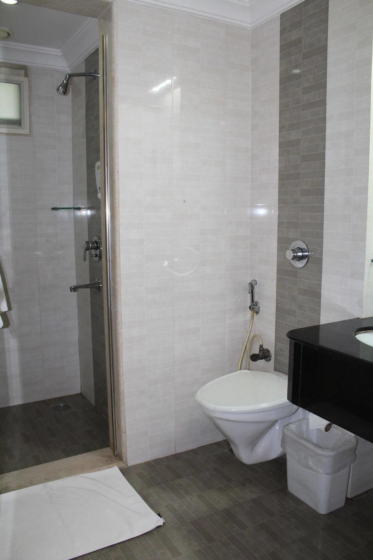The Lotus Hotel, Burkit Road Apartamento *