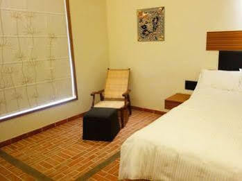 Fabhotel Illam Hospitality